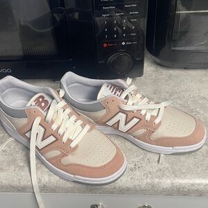 New Balance Blush and Cream Sneakers